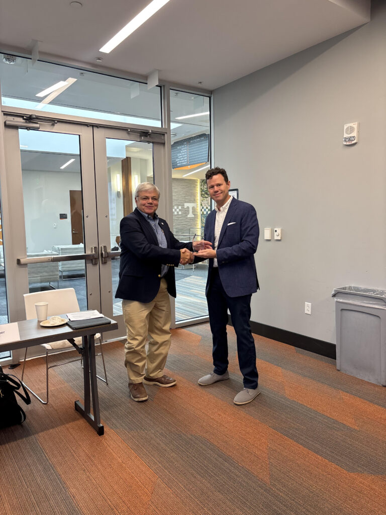 State Rep. Dennis Powers receives champion of business award
